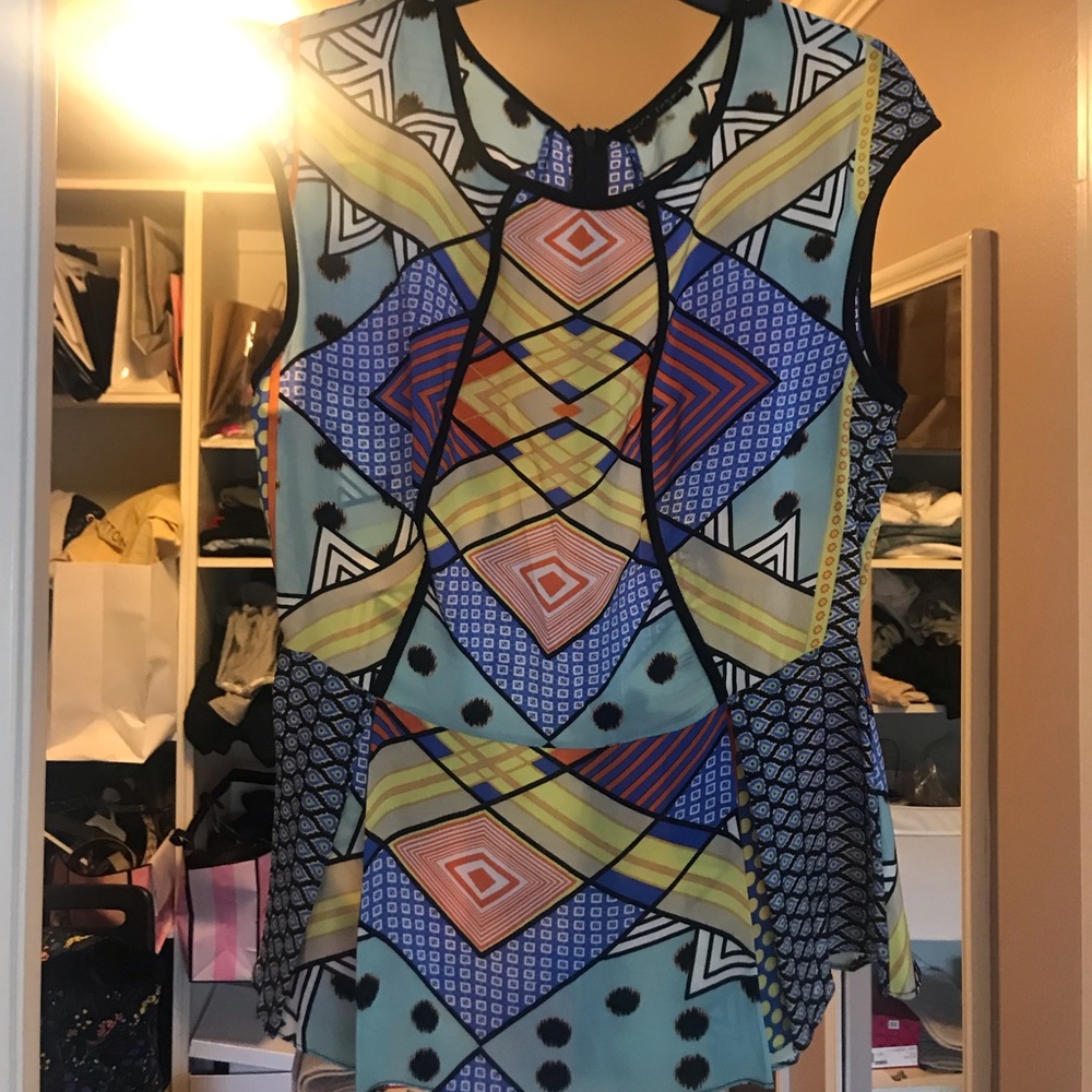 Cute peplum patterned top. Worn once